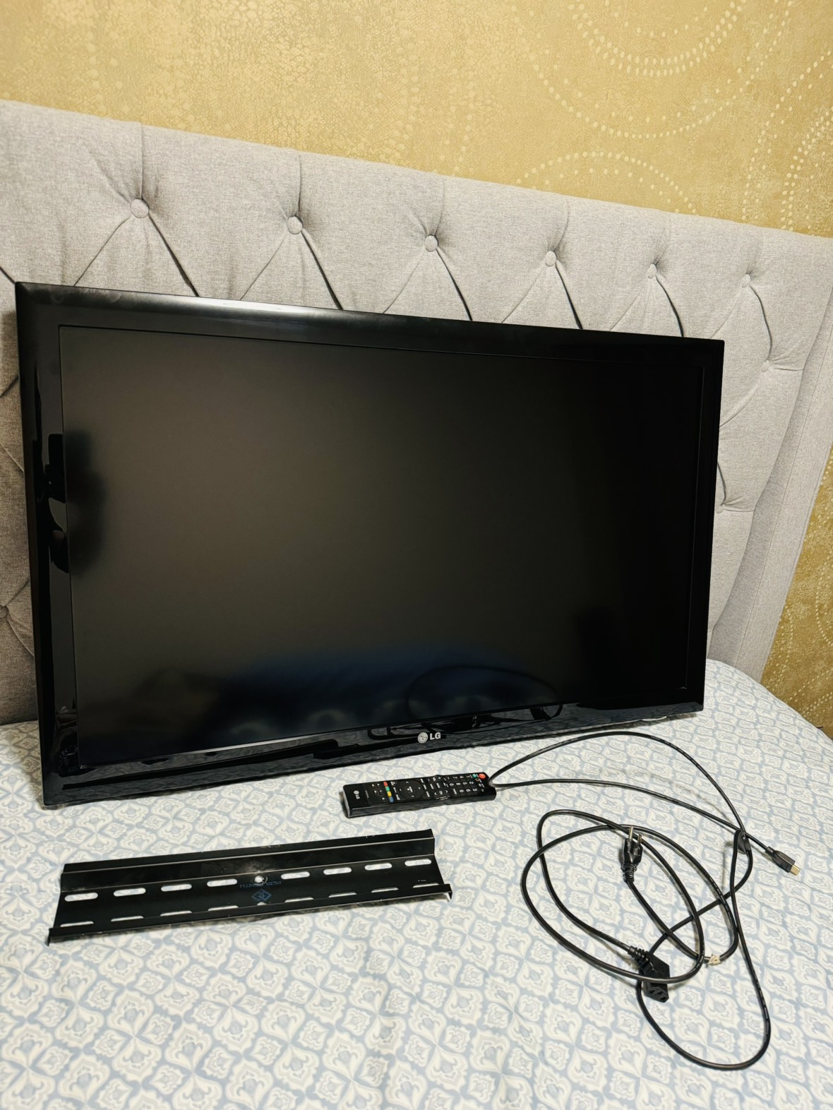 LG 42” TV WITH REMOTE AND MOUNT