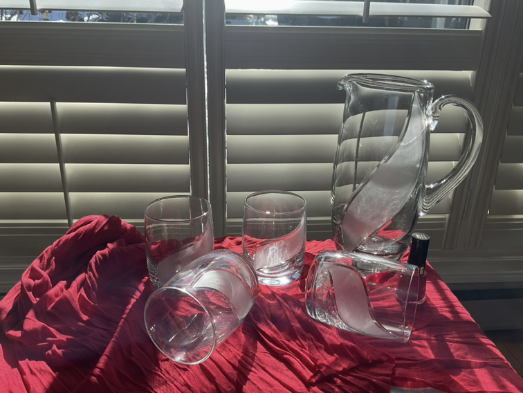 Etched glass pitcher and 4 glasses