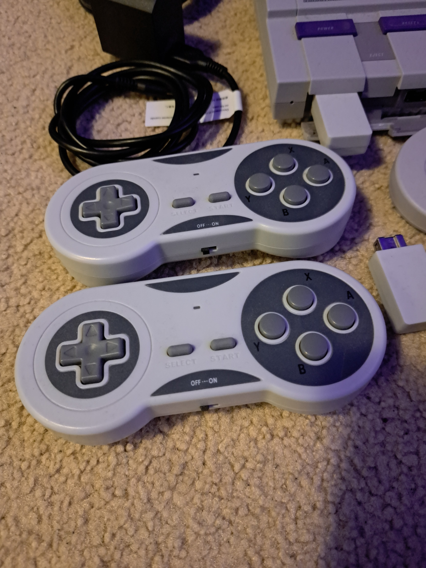 mini SNES + over 100 preloaded games  + 2 wireless controllers image indicator(2)