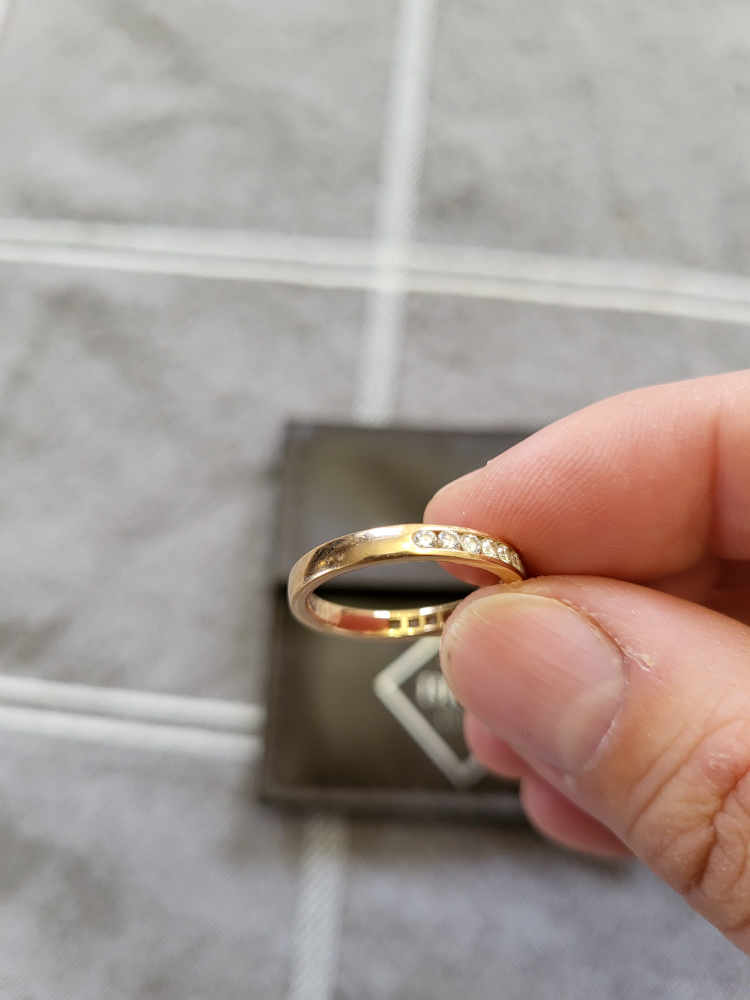 rose gold ring with 1/2 karat of diamonds
