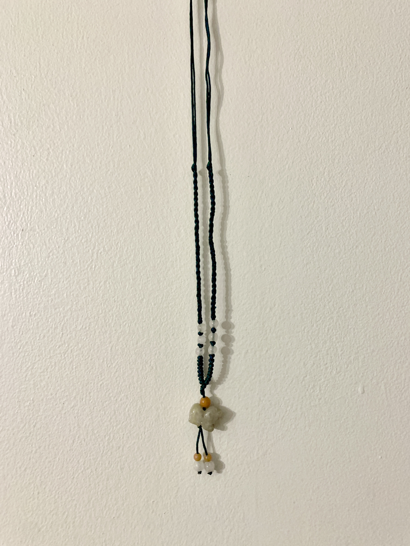 ‼️PRICE REDUCED‼️small jade piglet necklace adjustable string image indicator(2)