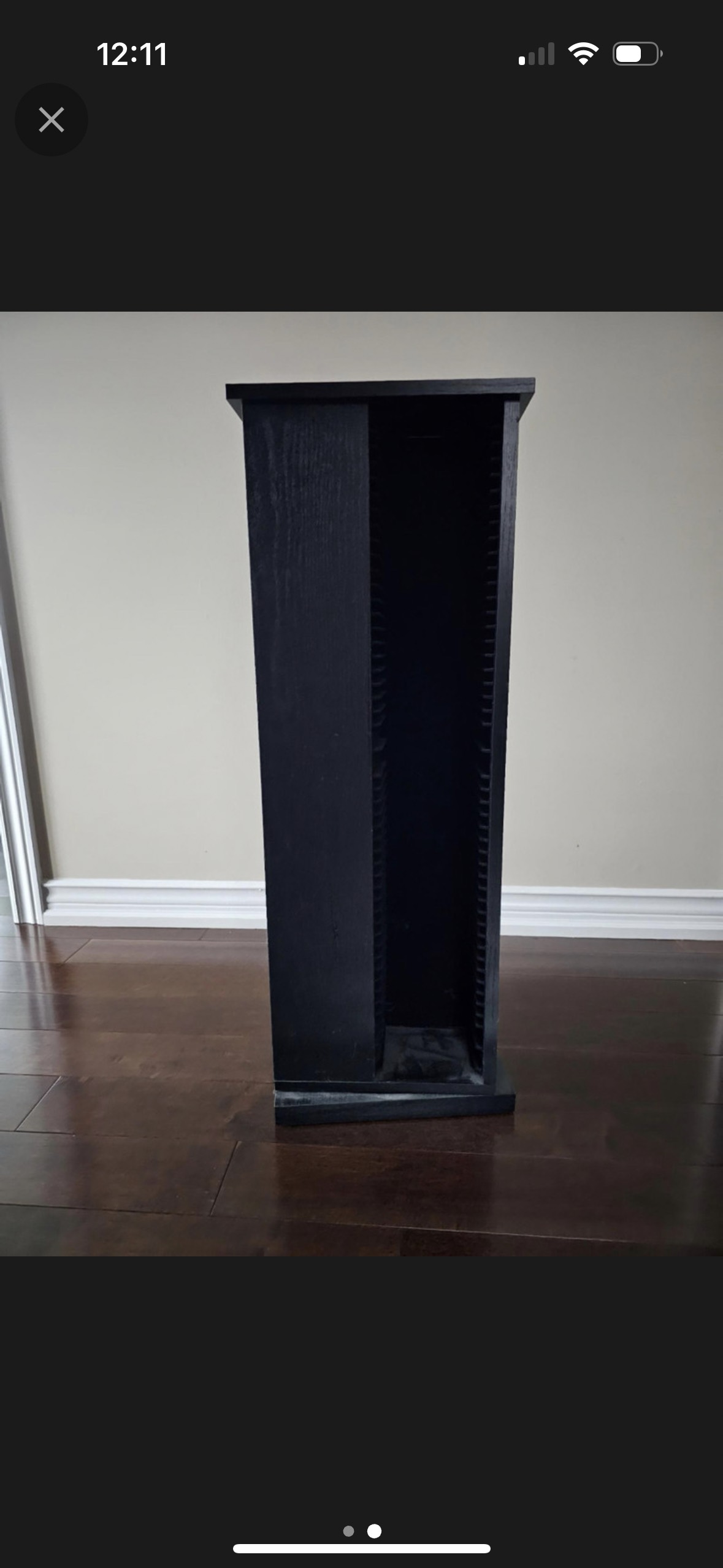 Two rotating CD case storage towers thumbnail