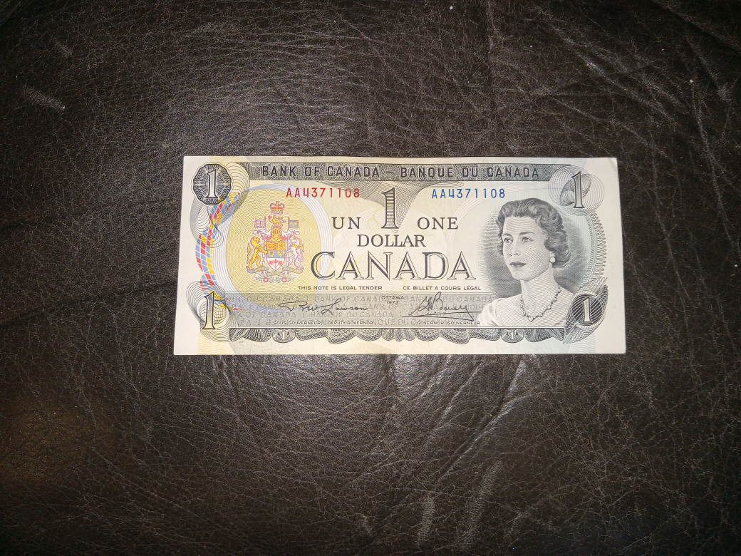 three1973 Canadian dollar bills