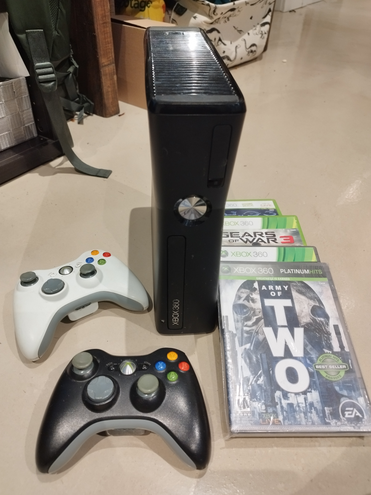 Xbox 360 with 2 controllers and games