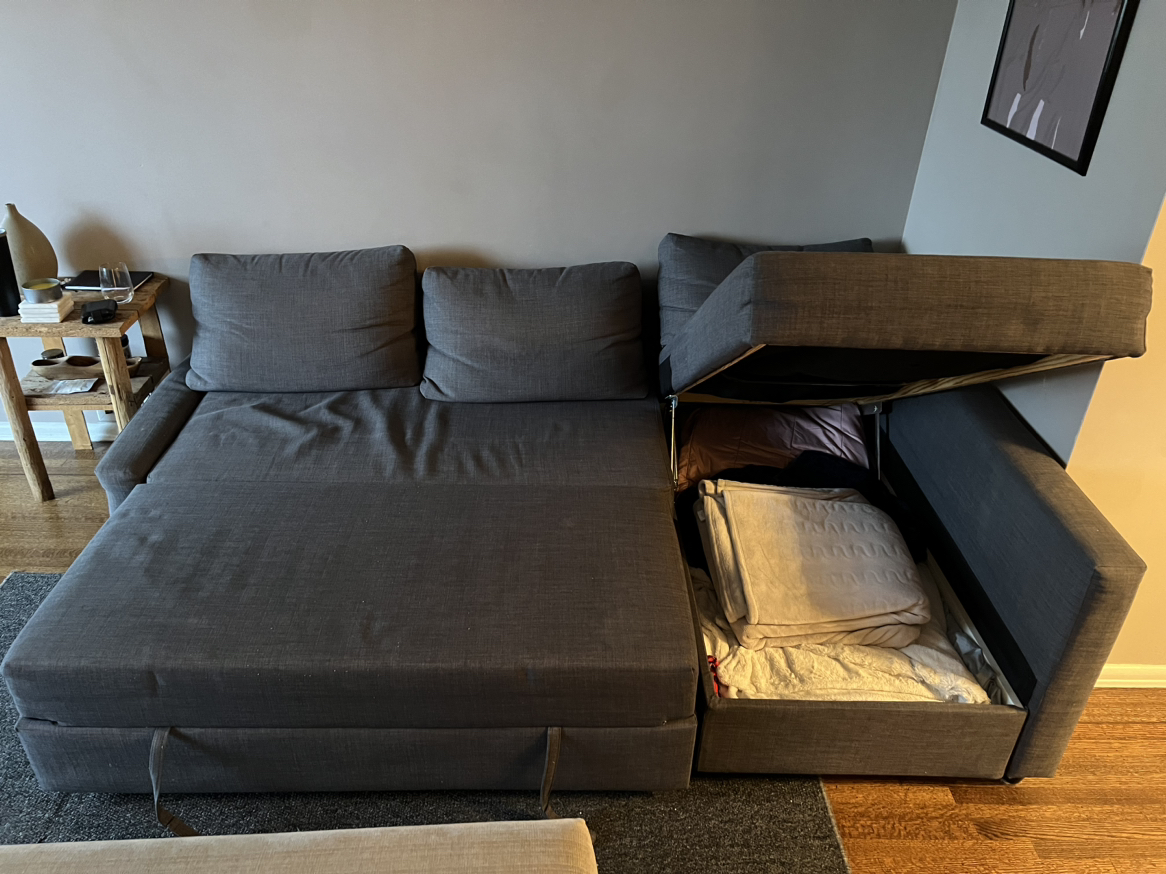 Sectional couch with pull out bed and storage - photo 2