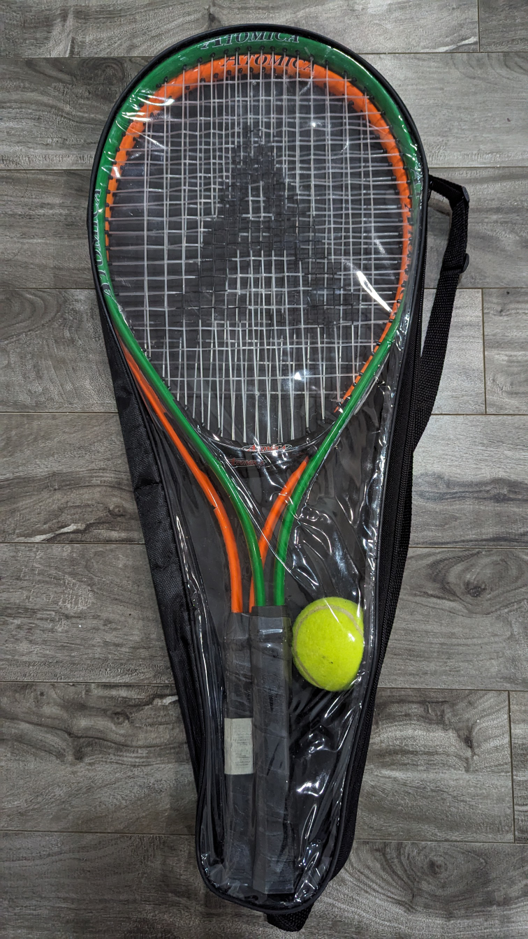 Tennis bat and ball