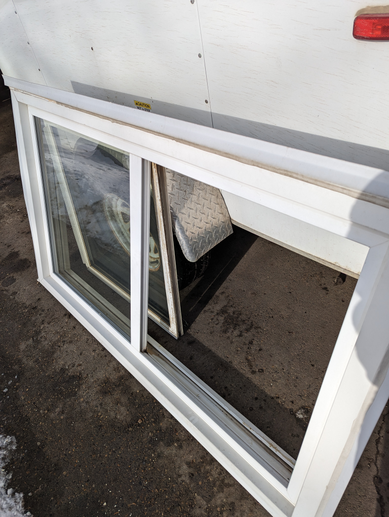 used 60x36 inch sliding PVC  windows good shape