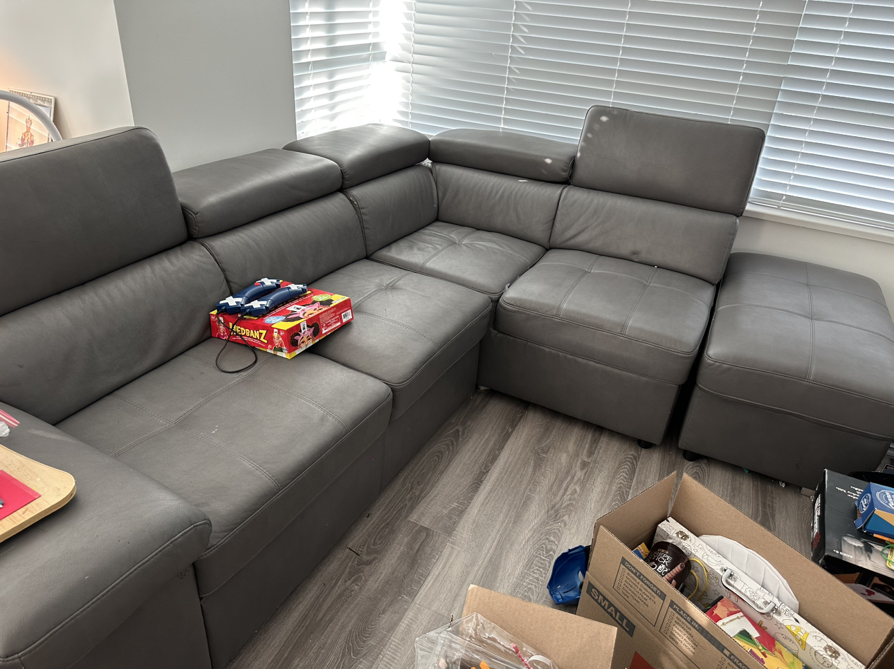 Sectional sofa bed with storage ottoman
