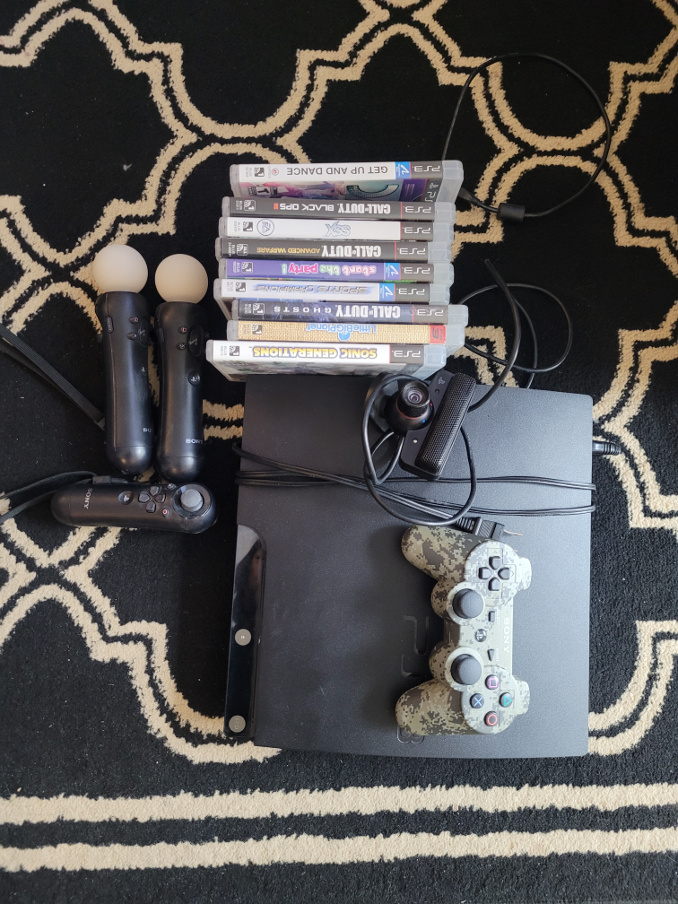 Playstation 3 plus move camera and controllers