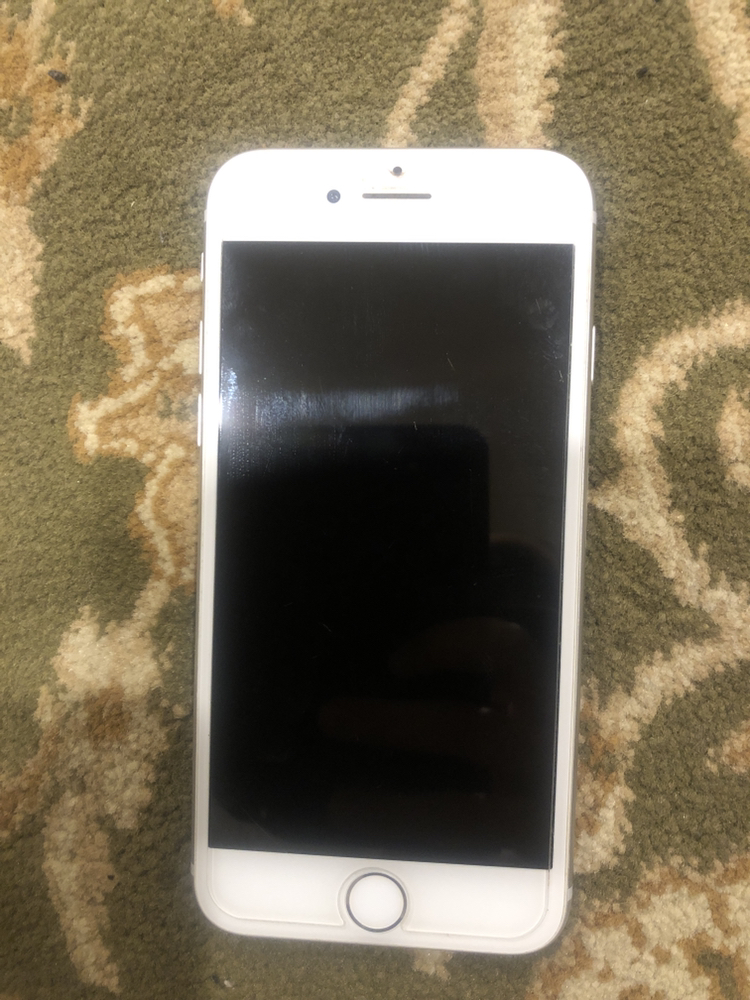 White IPhone 8 image indicator(3)