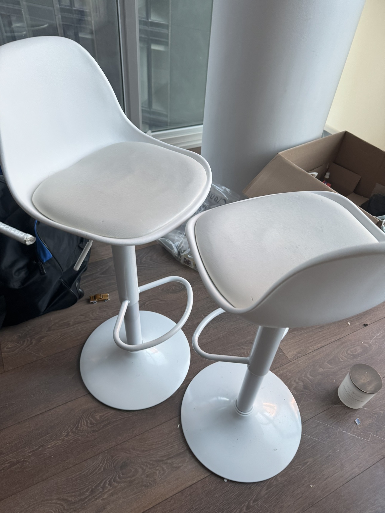 Two white barstools