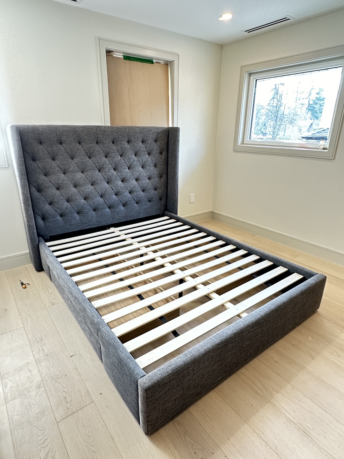 Queen size bed frame with elegant headboard plus 4 storage boxes