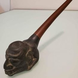 stone & wood pipe of native American design