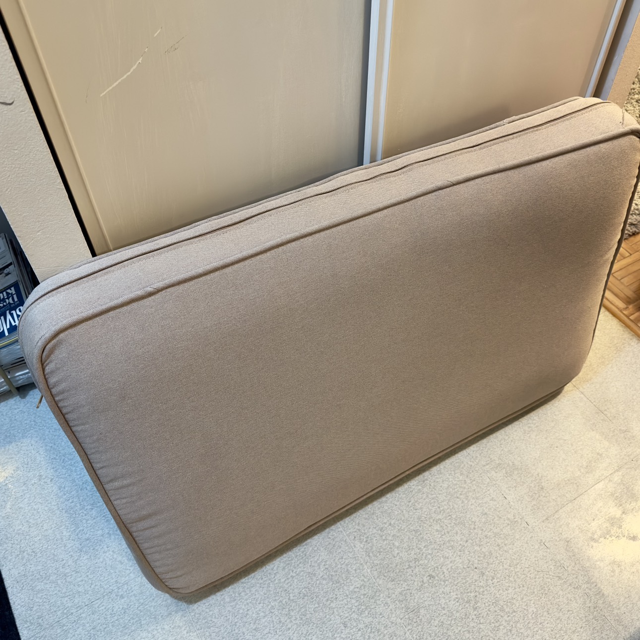 Cushion with beige cover image indicator(2)