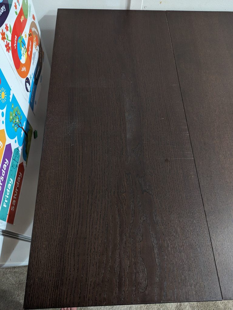IKEA dark wood extendable dining table - photo 4