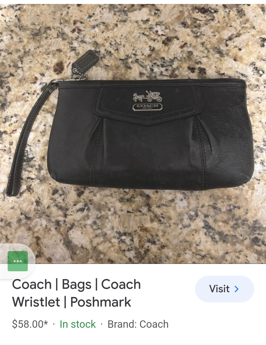 Coach wristlet, black leather exterior. image indicator(5)