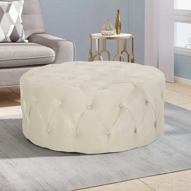 Brand New Cream Colour Velvet Round Ottoman. Still in box. $600.