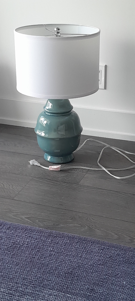 Beautiful sea-green ceramic lamp with white linen shade
