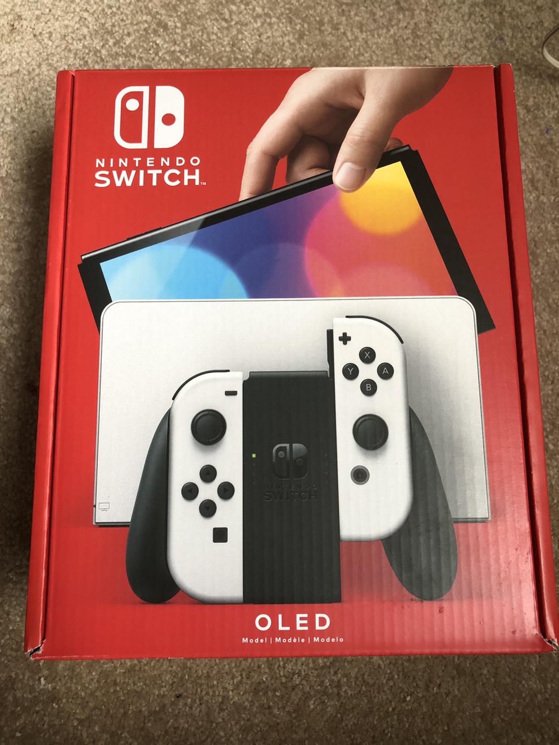 Nintendo Switch OLED (comes with games and case)