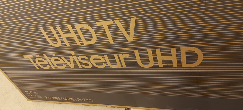 Samsung 50” UHD Tv 7 series and remote - photo 2