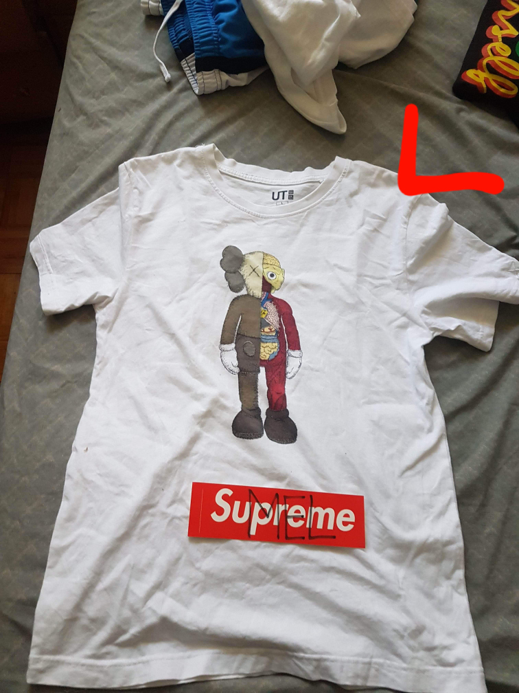 kaws shirt size l image indicator(2)
