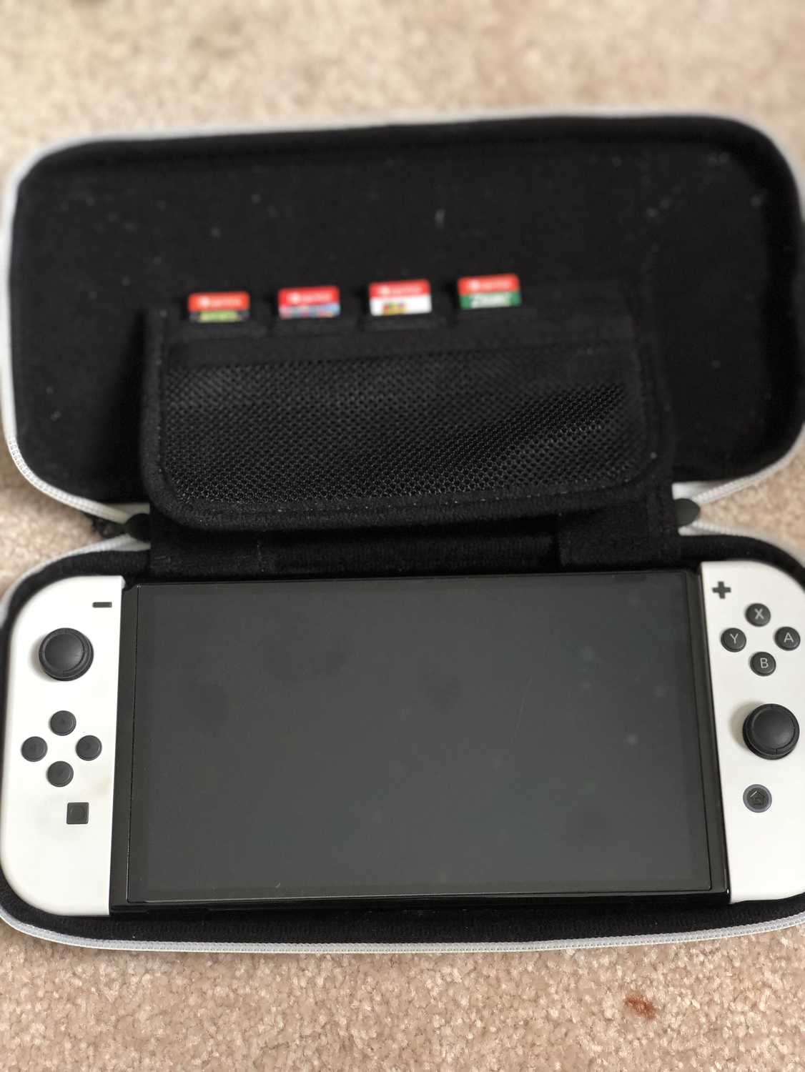 Nintendo Switch OLED (comes with games and case) - photo 3