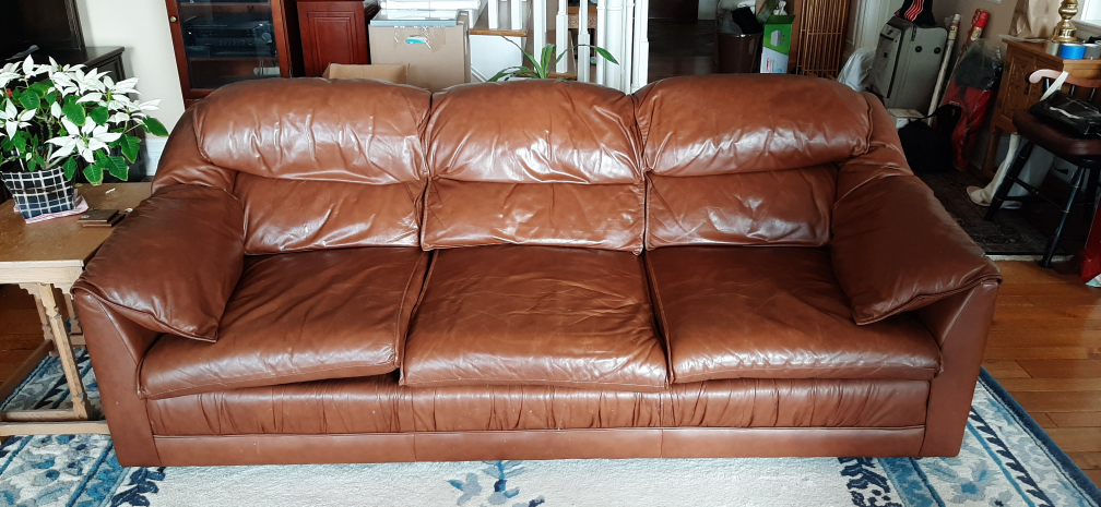 Leather sofa & matching chair.