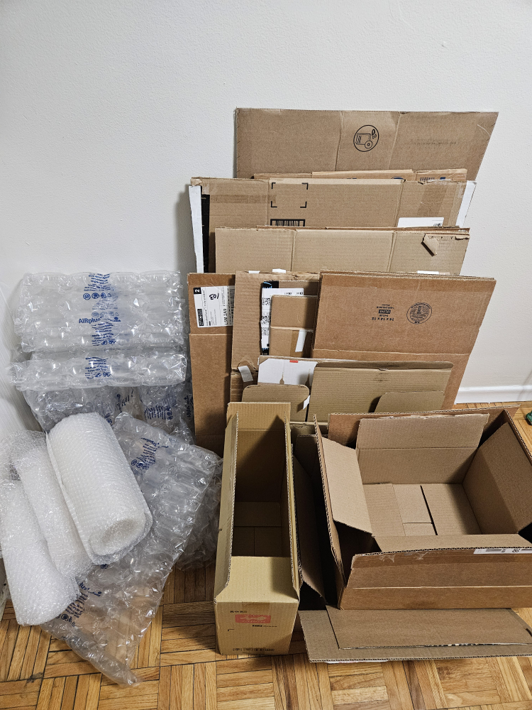 packing boxes and bubble wrap thumbnail