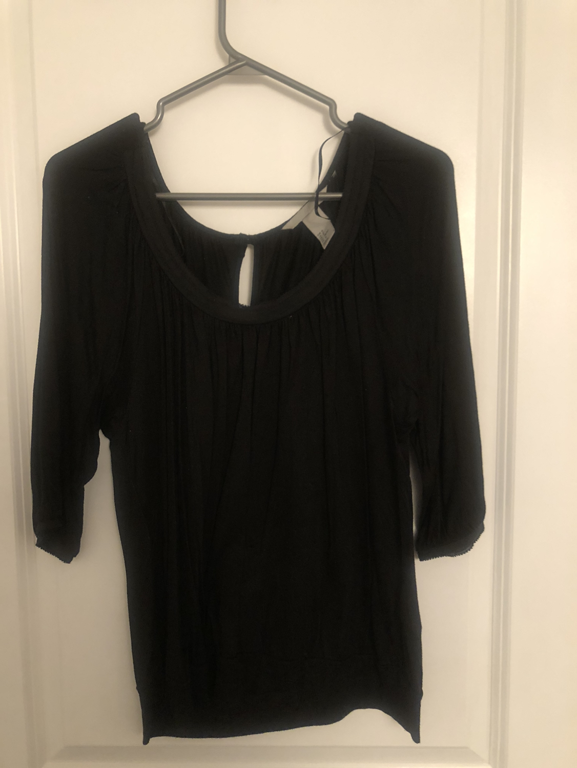 Black blouse with elastic cuff detail