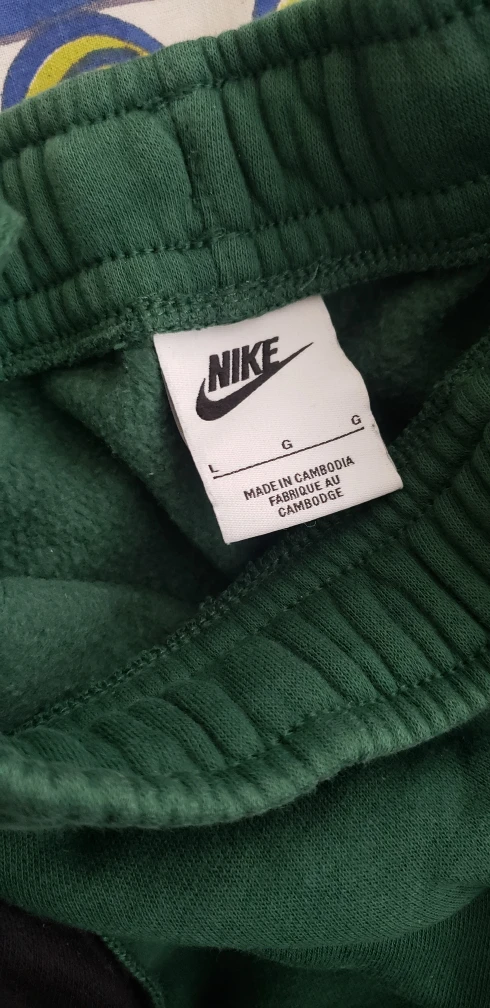 green nike pants image indicator(2)