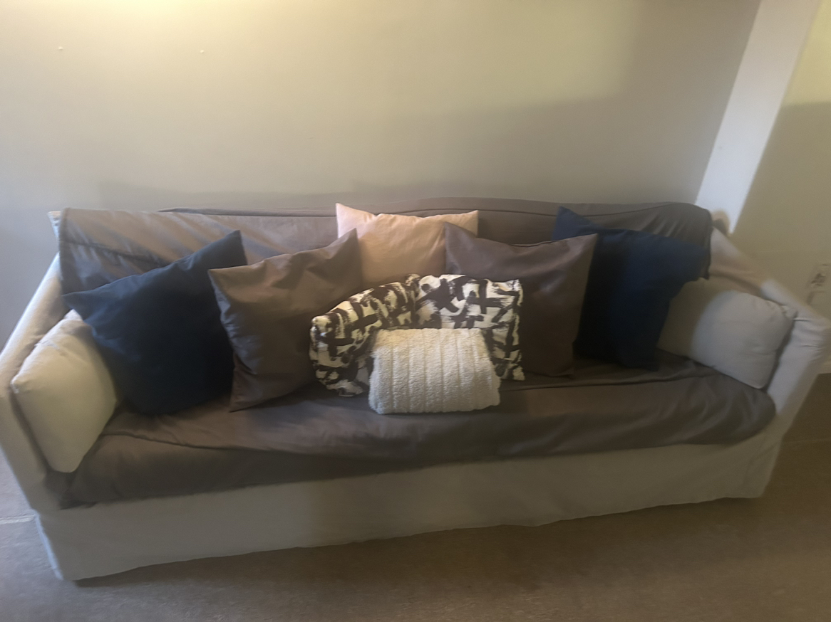 Couch- includes cushions and covers