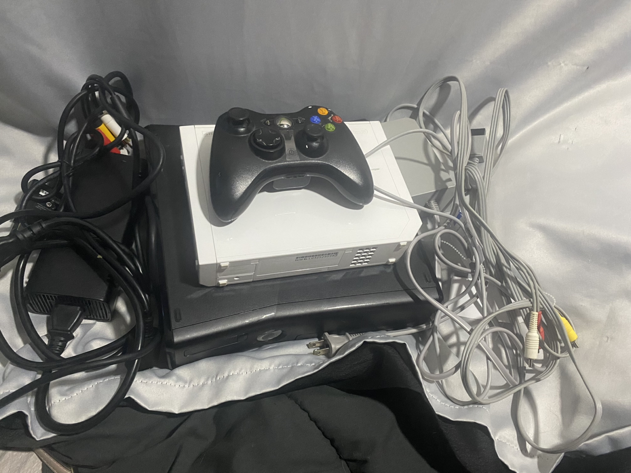Xbox 360 slim s with cords/controller and Wii with cords bundle