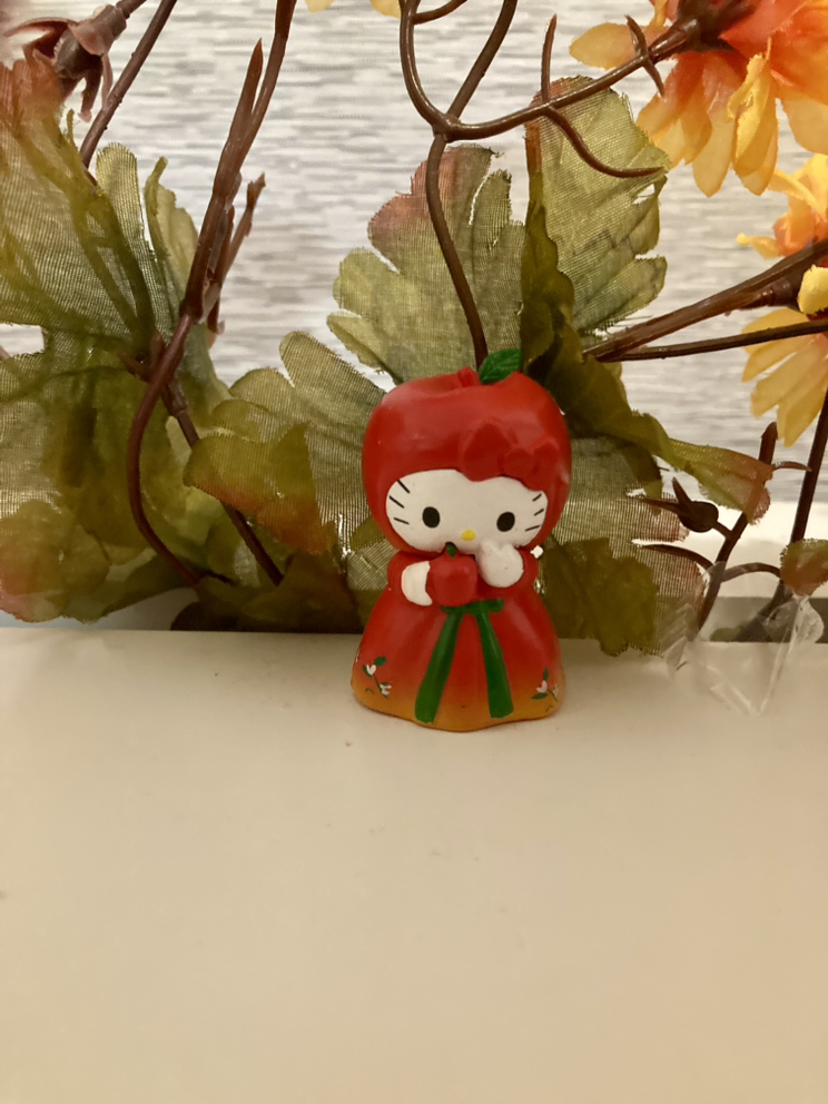 collectible apple hello kitty figure thumbnail