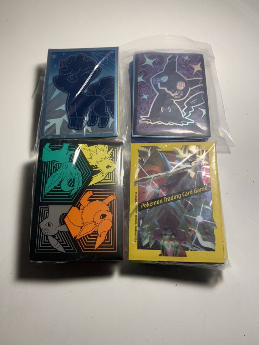 4 Packs of 53 Pokémon Cards!