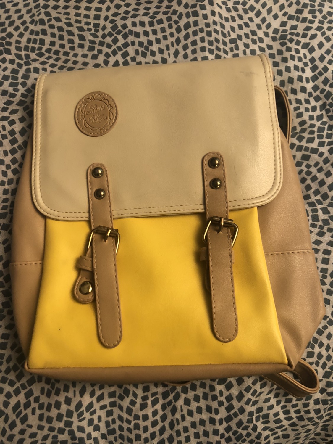 Small yellow backpack purse