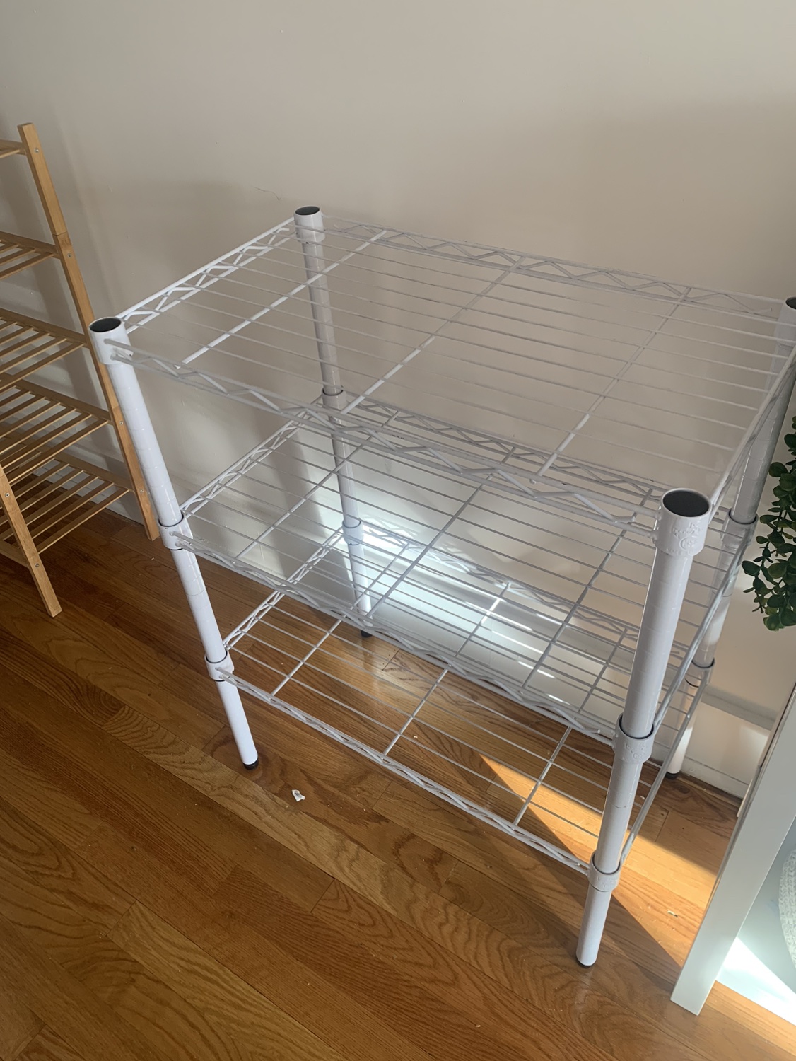 White metal shelf rack