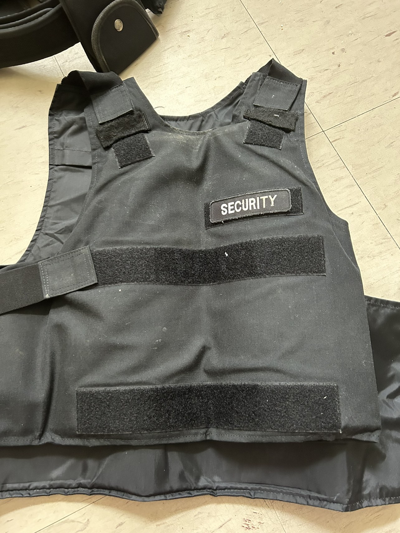 Secret vest with belt, rain jacket