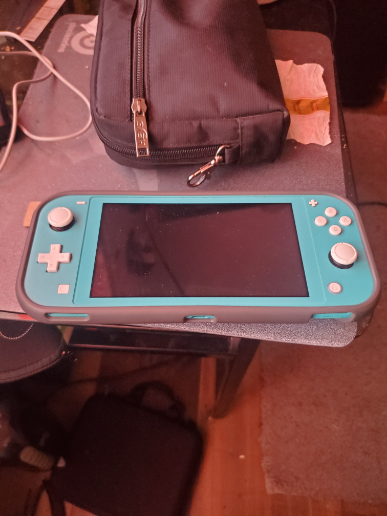 nintendo switch lite,turquoise with bumper gaurd,15 games thumbnail
