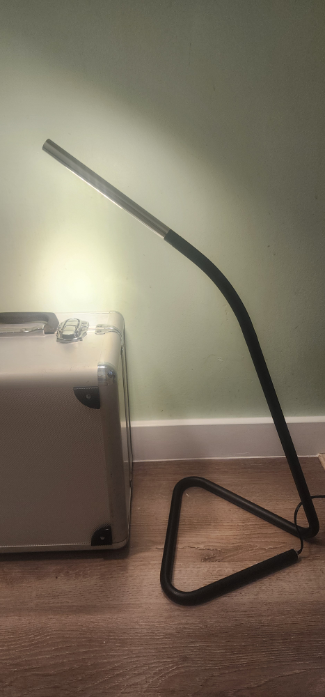 Book , a stainless cup and light. image indicator(2)