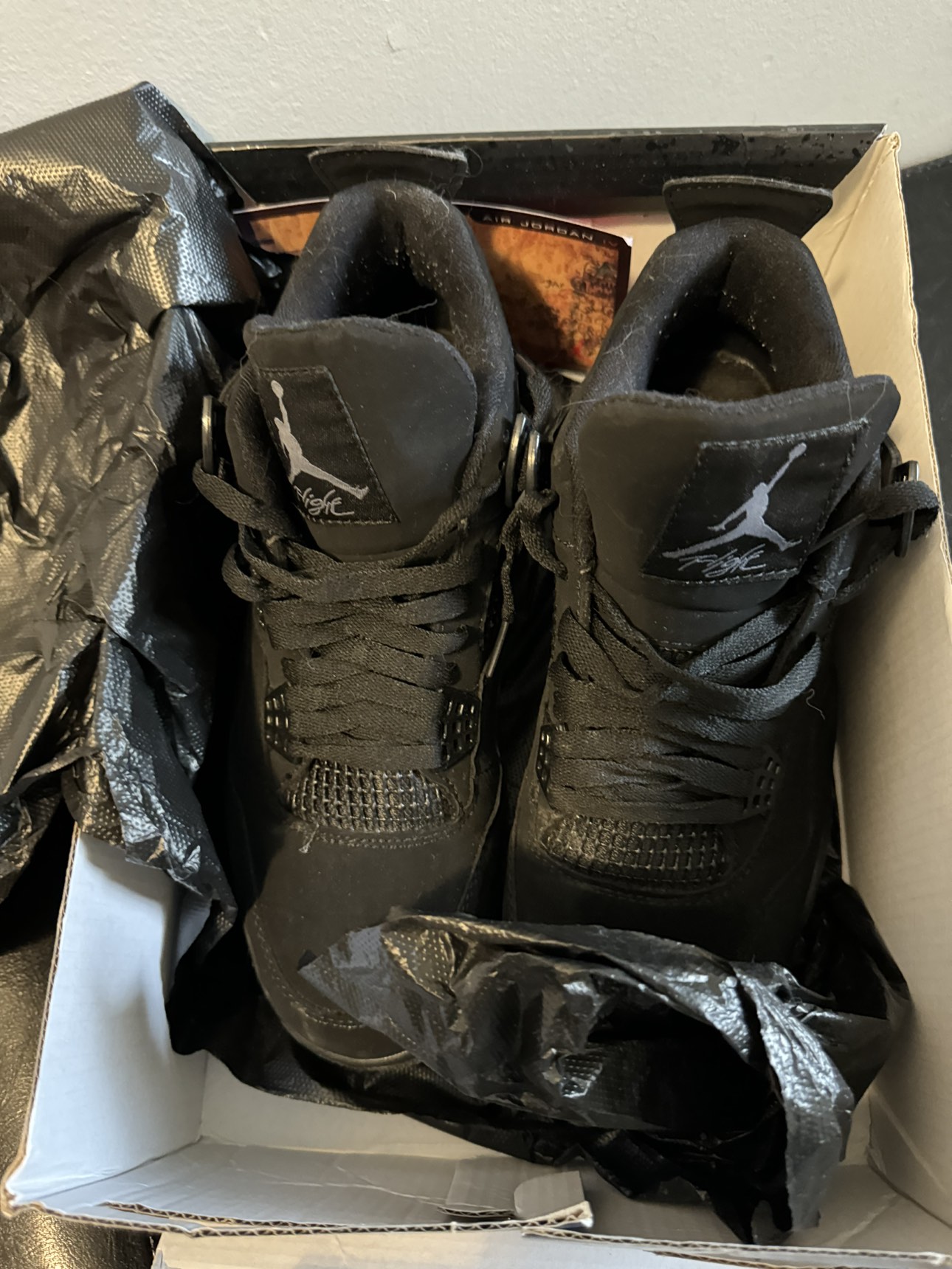 Men’s Air Jordan black cats worn