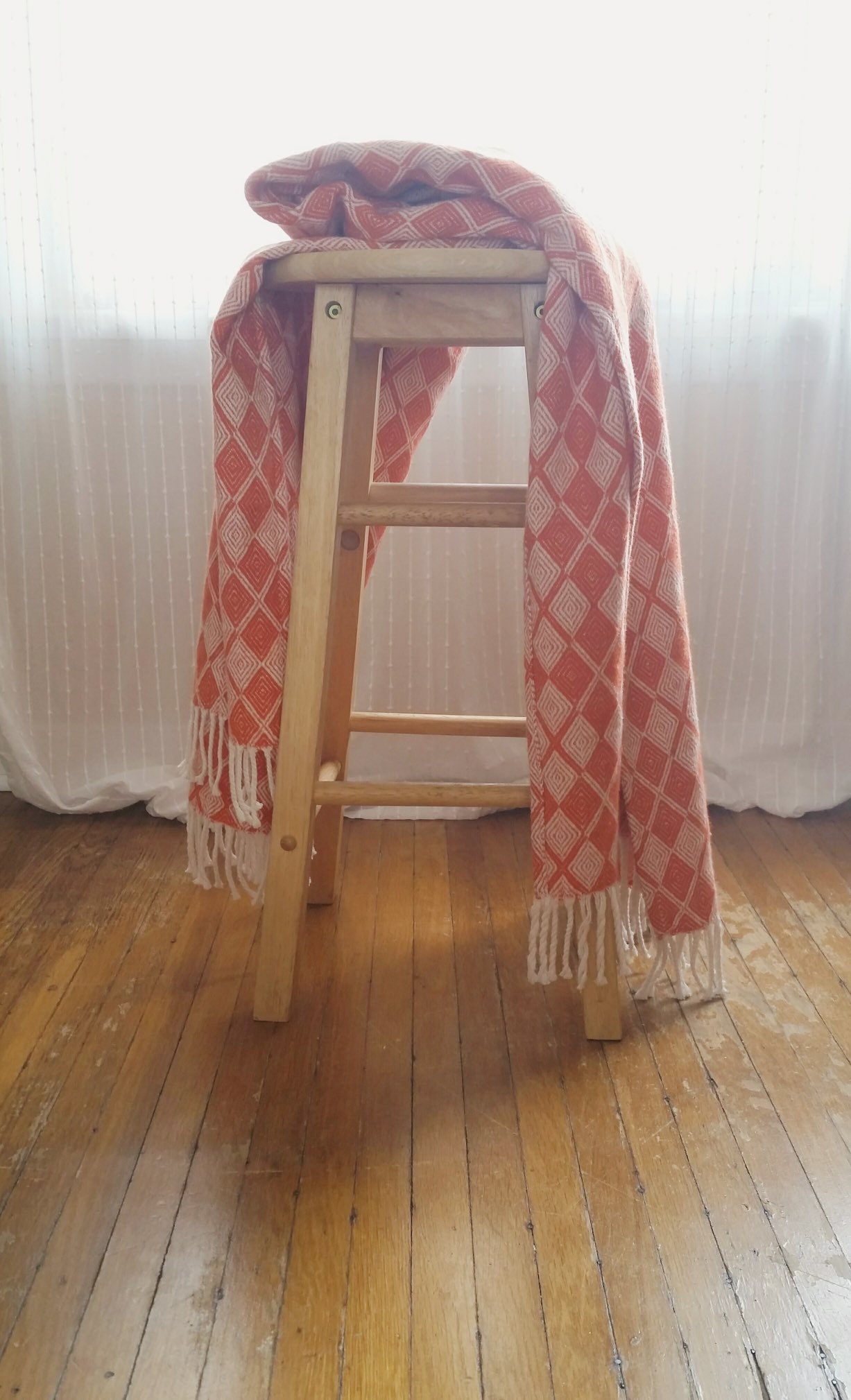 Woven patterned throw blanket • orange and cream image indicator(2)