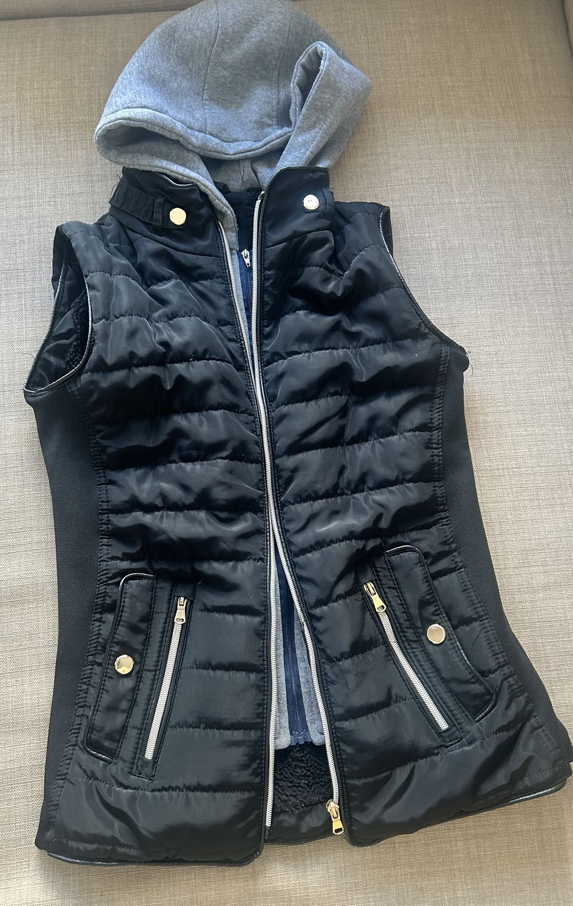 Black hooded vest