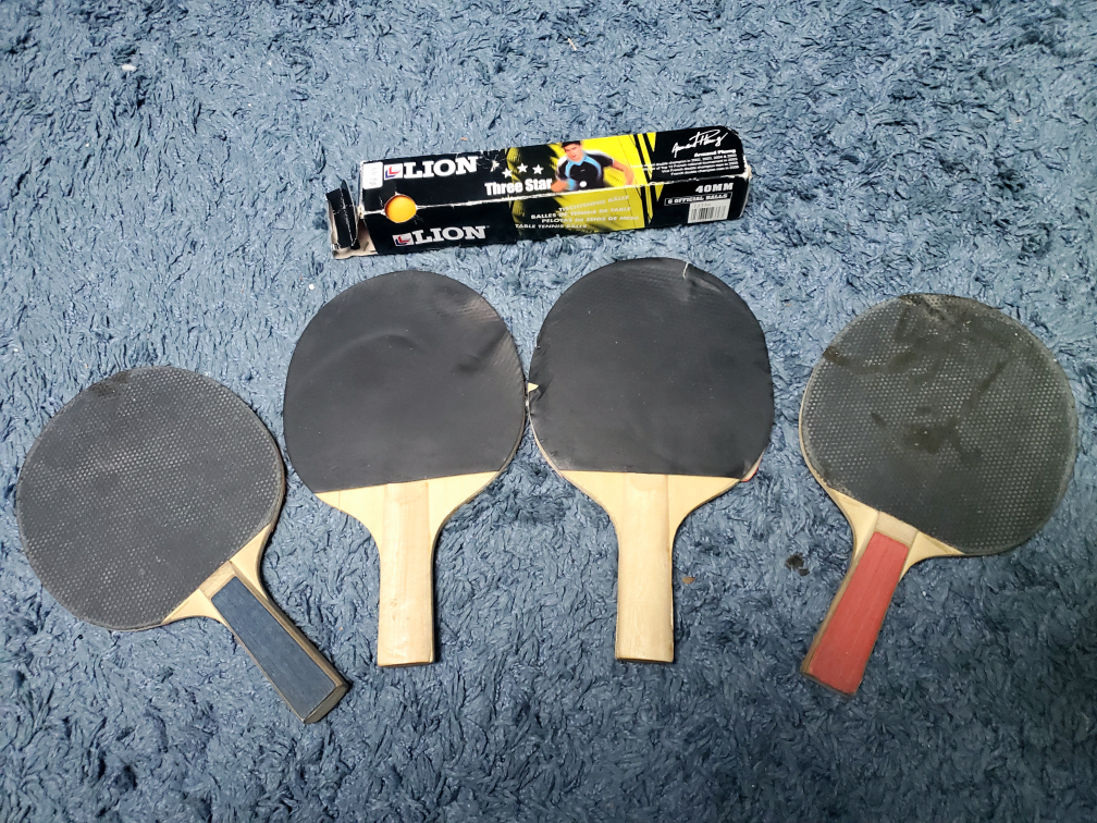 Ping pong paddles and balls