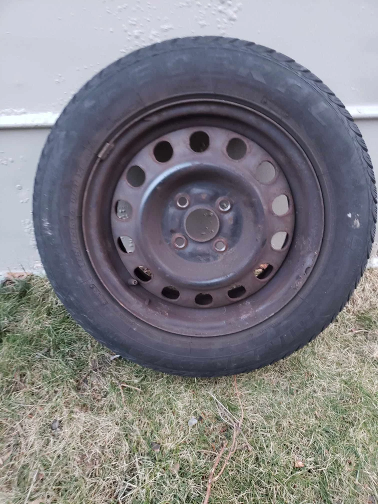 4 used snow tires with rims. - photo 2