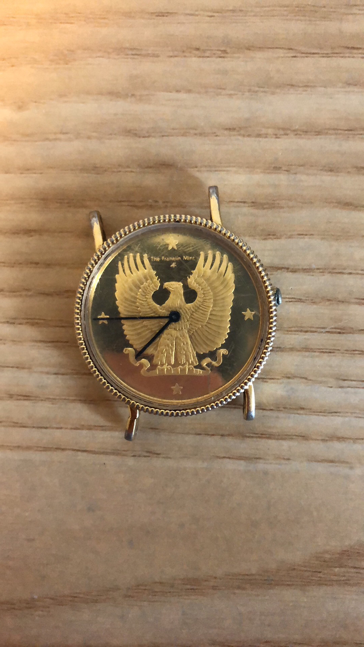 Gold watch thumbnail