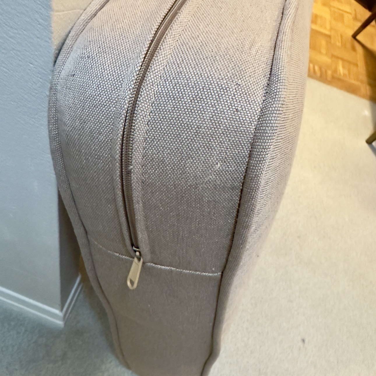 Cushion with beige cover image indicator(3)