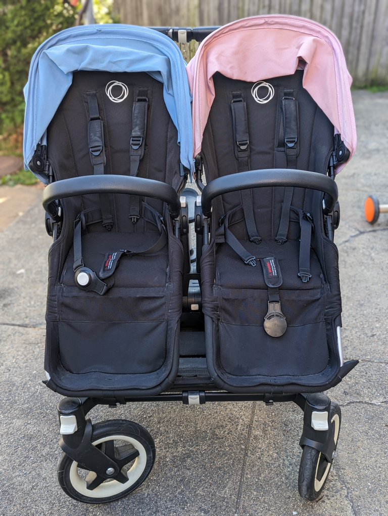 Bugaboo Donkey duo stroller with riding board and side basket. thumbnail