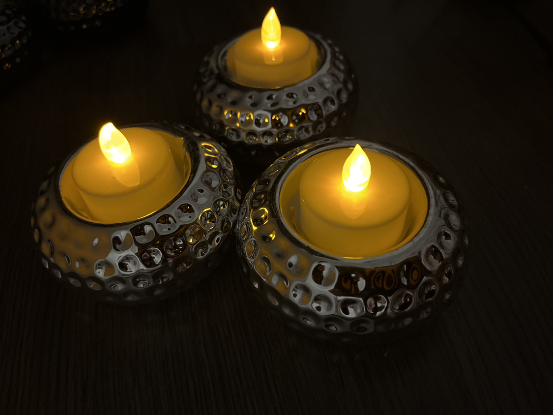 Set of 3 metallic silver tea light holders