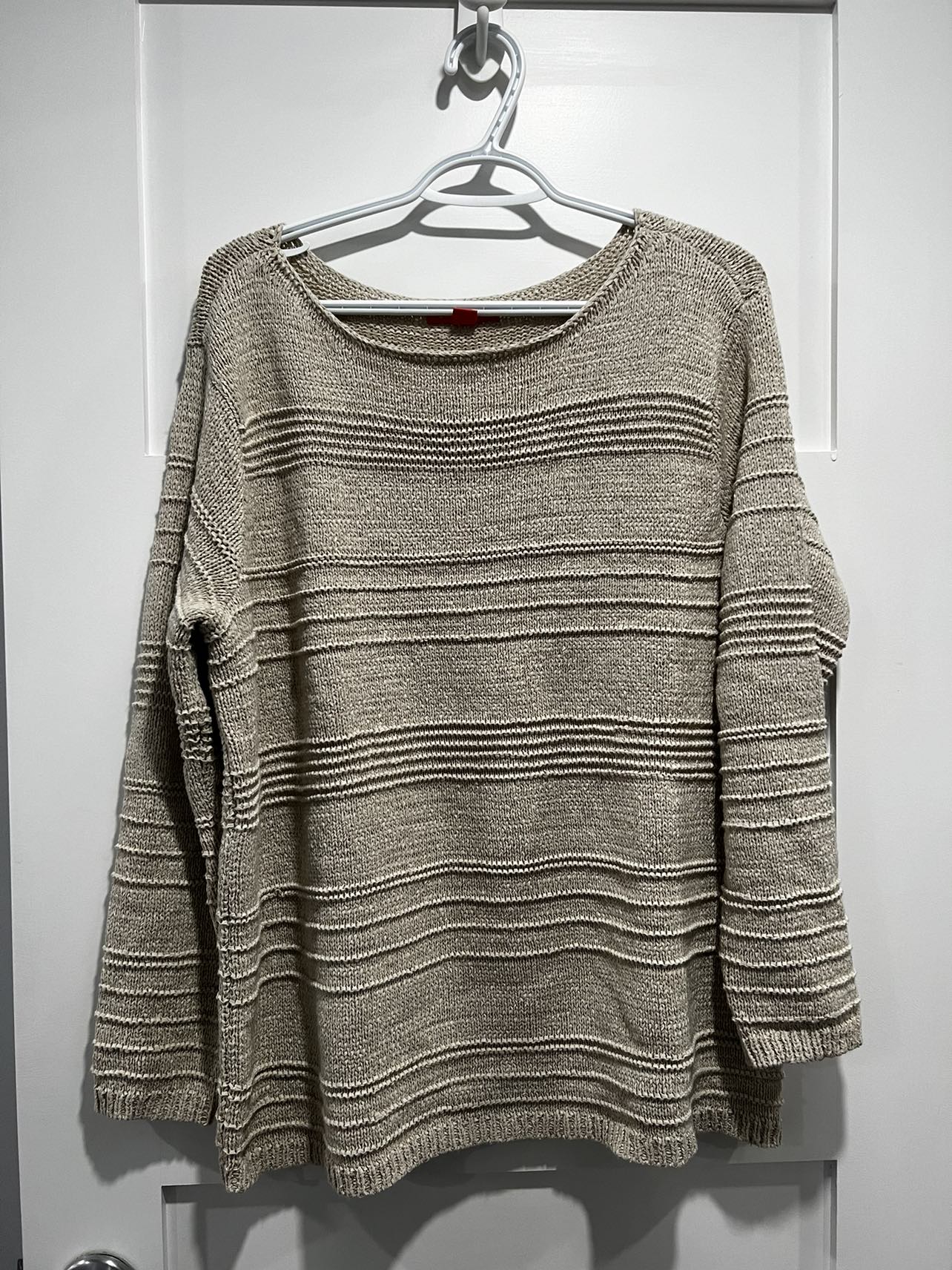 Woman’s sweater thumbnail
