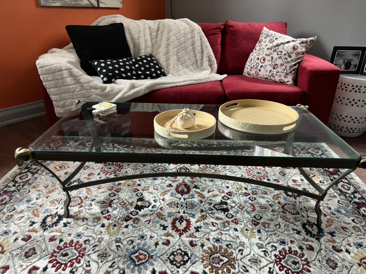 Glass top and steel leg coffee table